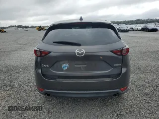 2020 Mazda CX-5 Grand Touring with VIN JM3KFADM6L0839527, listed as a Copart auction lot 46677475 with 50,305 mi miles and Salvage Title. Bid and sale history available at DreamBid. Image 6.