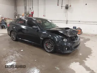 2011 Subaru Impreza Sedan WRX WRX Premium with VIN JF1GV7F6XBG517651, listed as a IAAI auction lot 41158551 with 141,334 mi miles. Bid and sale history available at carsss.com. Image 1.