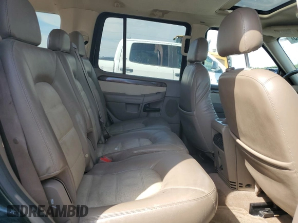 2004 Ford Explorer Eddie Bauer z VIN 1FMDU74EX4ZB29297, wystawiony jako Copart lot #62408465 z przebiegiem 198 818 mil mil oraz Szkoda całkowita • Salvage title. Historia ofert i sprzedaży dostępna na DreamBid. Obrazek 11.