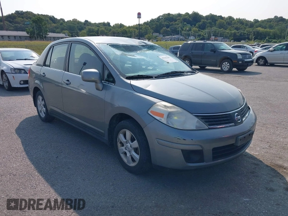 2007 Nissan Versa SL with VIN 3N1BC11E47L404371, listed as a IAAI auction lot 40309667 with 131,954 mi miles and . Bid and sale history available at DreamBid. Image 1.