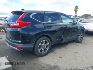 2017 Honda CR-V EX with VIN 7FARW1H55HE009693, listed as a IAAI auction lot 41539260 with 136,645 mi miles. Bid and sale history available at carsss.com. Image 4.