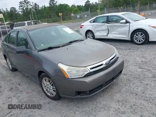 2009 Ford Focus SE with VIN 1FAHP35N49W178711, listed as a IAAI auction lot 42084721 with 203,889 mi miles. Bid and sale history available at carsss.com. Image 1.