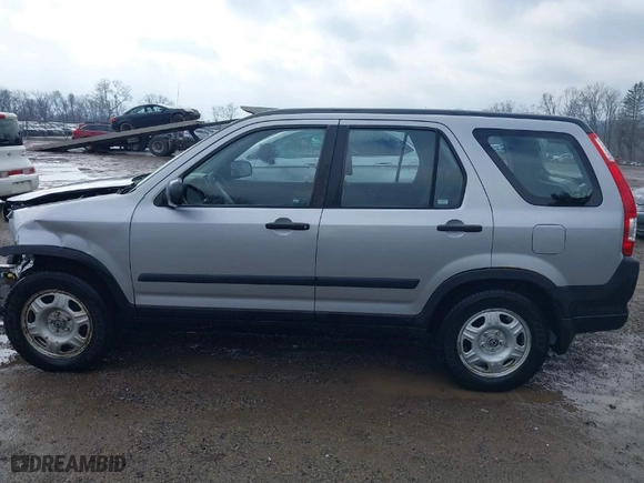 2005 Honda CR-V LX with VIN JHLRD78535C042479, listed as a IAAI auction lot 41682963 with 216,777 mi miles. Bid and sale history available at carsss.com. Image 15.
