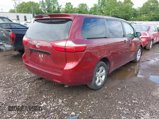 2016 Toyota Sienna L with VIN 5TDZK3DC7GS752874, listed as a IAAI auction lot 42509340 with 100,051 mi miles and . Bid and sale history available at DreamBid. Image 4.