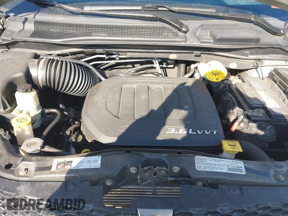 2014 Dodge Grand Caravan SXT 30th Anniversary with VIN 2C4RDGCG3ER119994, listed as a IAAI auction lot 42062017 with 96,909 mi miles and . Bid and sale history available at DreamBid. Image 10.
