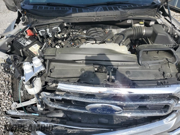 2023 Ford F-150 XL with VIN 1FTEW1C50PKF91124, listed as a Copart auction lot 51538865 with 22,128 mi miles and Salvage title. Bid and sale history available at DreamBid. Image 12.