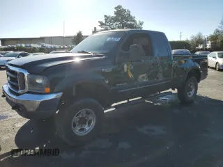 1999 Ford Super Duty F-250 XL with VIN 1FTNX21F6XEE43931, listed as a Copart auction lot 43823295 with 221,551 mi miles and Salvage Title. Bid and sale history available at carsss.com. Image 1.