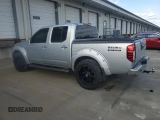 2006 Nissan Frontier SE with VIN 1N6AD07W36C423033, listed as a Copart auction lot 53135935 with 182,467 mi miles and Salvage title. Bid and sale history available at DreamBid. Image 2.