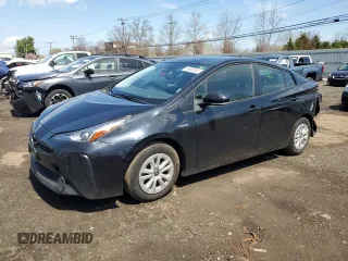 2021 Toyota Prius L Eco with VIN JTDKAMFU6M3150108, listed as a Copart auction lot 53690385 with 105,765 mi miles and Salvage Title. Bid and sale history available at carsss.com. Image 1.