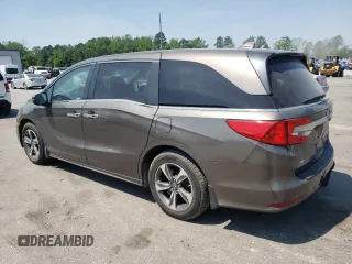 2019 Honda Odyssey Touring z VIN 5FNRL6H87KB098010, wystawiony jako Copart lot #54791505 z przebiegiem 94 477 mil mil oraz Szkoda całkowita • Salvage title. Historia ofert i sprzedaży dostępna na DreamBid. Obrazek 2.