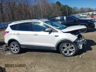 2017 Ford Escape Titanium with VIN 1FMCU0JD6HUE01006, listed as a IAAI auction lot 41632918 with 70,927 mi miles. Bid and sale history available at carsss.com. Image 13.