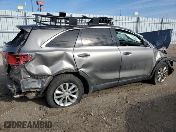 2016 Kia Sorento LX z VIN 5XYPGDA59GG072038, wystawiony jako Copart lot #50221465 z przebiegiem Nie podano mil oraz Szkoda całkowita • Salvage title. Historia ofert i sprzedaży dostępna na DreamBid. Obrazek 3.