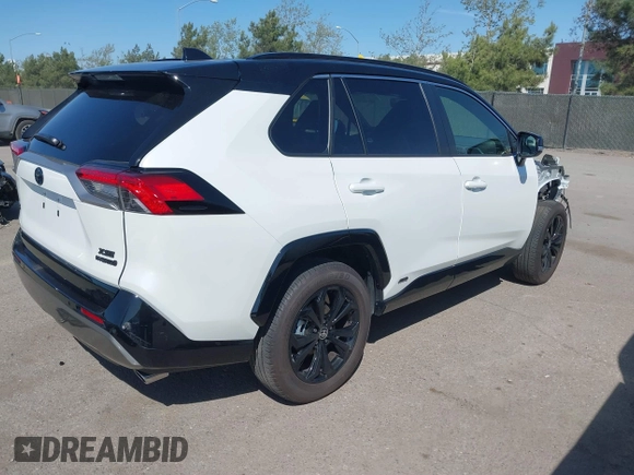 2024 Toyota RAV4 Hybrid XSE with VIN JTME6RFV3RD549984, listed as a IAAI auction lot 41861868 with 8,742 mi miles. Bid and sale history available at carsss.com. Image 4.