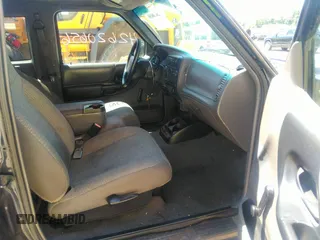 2002 Ford Ranger XL with VIN 1FTZR15EX2TA60649, listed as a IAAI auction lot 42620656 with 187,542 mi miles and . Bid and sale history available at DreamBid. Image 5.