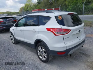 2013 Ford Escape SE with VIN 1FMCU0G90DUB37052, listed as a IAAI auction lot 42132973 with 169,975 mi miles and . Bid and sale history available at DreamBid. Image 3.