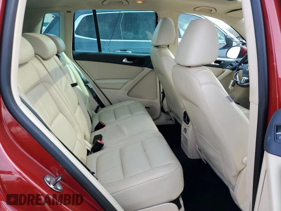 2011 Volkswagen Tiguan SE with VIN WVGBV7AX7BW001124, listed as a Copart auction lot 53044005 with 150,072 mi miles and Salvage Title. Bid and sale history available at DreamBid. Image 11.