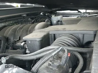 2018 GMC Yukon Denali z VIN 1GKS1CKJ3JR313123, wystawiony jako IAAI lot #42492406 z przebiegiem 95 077 mil mil oraz . Historia ofert i sprzedaży dostępna na DreamBid. Obrazek 19.