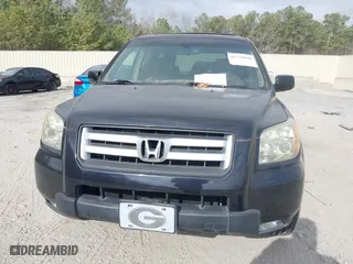 2006 Honda Pilot EX-L with VIN 5FNYF28576B030507, listed as a IAAI auction lot 41720898 with 201,518 mi miles. Bid and sale history available at carsss.com. Image 6.