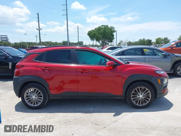2021 Hyundai Kona SEL with VIN KM8K22AA8MU601480, listed as a IAAI auction lot 39589701 with 55,876 mi miles and . Bid and sale history available at carsss.com. Image 13.
