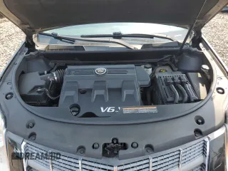 2011 Cadillac SRX Premium Collection z VIN 3GYFNFEY9BS606335, wystawiony jako Copart lot #59009285 z przebiegiem 152 828 mil mil oraz Szkoda całkowita • Salvage title. Historia ofert i sprzedaży dostępna na DreamBid. Obrazek 12.