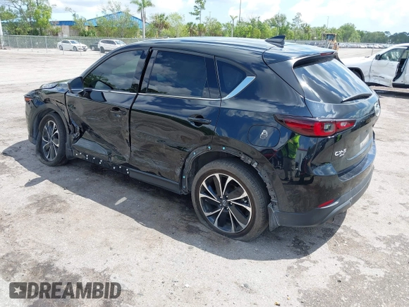 2023 Mazda CX-5 2.5 S Premium Plus Package with VIN JM3KFBEM5P0256652, listed as a IAAI auction lot 41936376 with 31,332 mi miles. Bid and sale history available at carsss.com. Image 3.