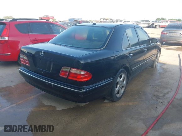 2002 Mercedes-Benz E 320 with VIN WDBJF70J02B477523, listed as a IAAI auction lot 42136739 with 251,354 mi miles and . Bid and sale history available at DreamBid. Image 4.