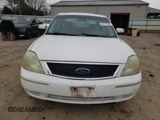 2005 Ford Five Hundred SE z VIN 1FAFP231X5G165841, wystawiony jako Copart lot #43117535 z przebiegiem 154 874 mil mil oraz Czysty tytuł • Clean title. Historia ofert i sprzedaży dostępna na DreamBid. Obrazek 5.