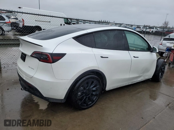 2022 Tesla Model Y Long Range with VIN 7SAYGDEE1NF491488, listed as a Copart auction lot 49266945 with 44,703 mi miles and Salvage Title. Bid and sale history available at carsss.com. Image 3.