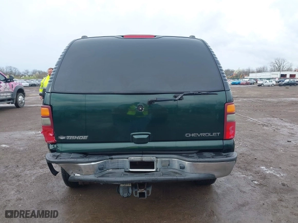 2002 Chevrolet Tahoe LT with VIN 1GNEK13Z22J154097, listed as a IAAI auction lot 41913119 with 243,978 mi miles. Bid and sale history available at carsss.com. Image 16.