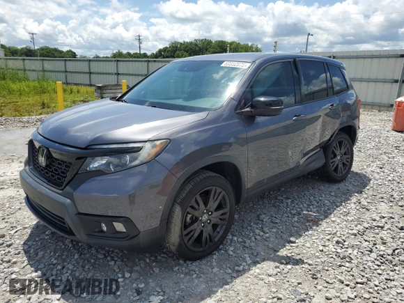 2021 Honda Passport EX-L with VIN 5FNYF8H54MB002017, listed as a Copart auction lot 59850975 with 54,275 mi miles and Salvage title. Bid and sale history available at DreamBid. Image 1.