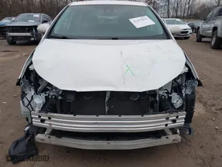 2021 Toyota Prius L Eco with VIN JTDKAMFU1M3149867, listed as a IAAI auction lot 41417036 with 84,421 mi miles. Bid and sale history available at carsss.com. Image 6.