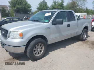 2005 Ford F-150 STX with VIN 1FTRX14W85NA00409, listed as a IAAI auction lot 42125903 with 160,230 mi miles and . Bid and sale history available at DreamBid. Image 2.