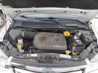 2015 Chrysler Town & Country Touring-L with VIN 2C4RC1CG9FR573863, listed as a IAAI auction lot 42036034 with 141,390 mi miles. Bid and sale history available at carsss.com. Image 10.