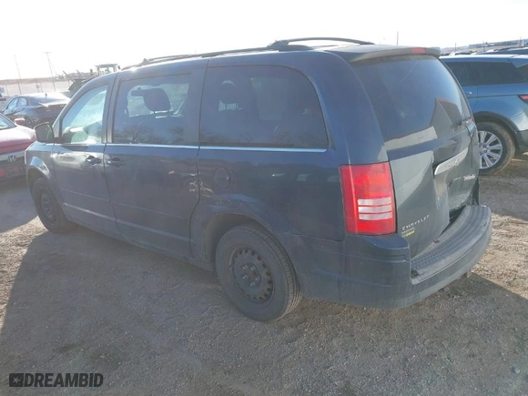 2009 Chrysler Town & Country LX with VIN 2A8HR44E69R617338, listed as a IAAI auction lot 41647395 with 365,362 mi miles. Bid and sale history available at carsss.com. Image 3.