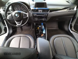 2016 BMW X1 xDrive28i with VIN WBXHT3C3XGP880243, listed as a Copart auction lot 54556895 with 57,200 mi miles and Clean Title. Bid and sale history available at carsss.com. Image 9.