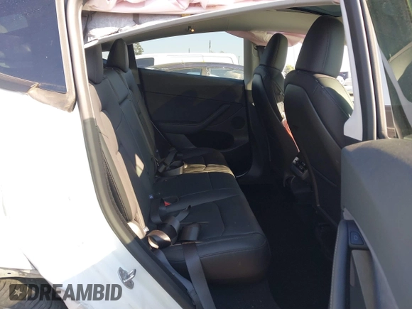 2024 Tesla Model Y Long Range with VIN 7SAYGDEE0RF209847, listed as a IAAI auction lot 41447620 with 7,646 mi miles and . Bid and sale history available at DreamBid. Image 8.