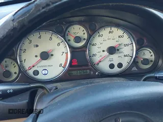 2002 Mazda MX-5 Miata Cloth z VIN JM1NB353920234533, wystawiony jako IAAI lot #41735487 z przebiegiem 112 661 mil mil oraz . Historia ofert i sprzedaży dostępna na DreamBid. Obrazek 7.