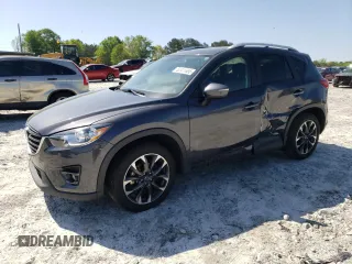 2016 Mazda CX-5 Grand Touring with VIN JM3KE2DY6G0894304, listed as a Copart auction lot 52411685 with 114,611 mi miles and Salvage Title. Bid and sale history available at carsss.com. Image 1.