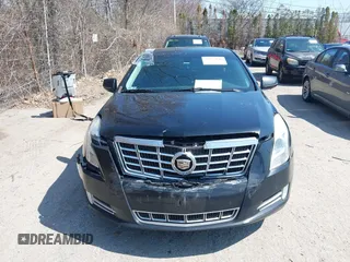 2013 Cadillac XTS Luxury with VIN 2G61P5S3XD9220510, listed as a IAAI auction lot 41977046 with 236,009 mi miles and . Bid and sale history available at DreamBid. Image 11.