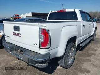 2015 GMC Canyon 2WD SLT with VIN 1GTG5CE36F1151433, listed as a IAAI auction lot 41636107 with 117,682 mi miles. Bid and sale history available at carsss.com. Image 4.