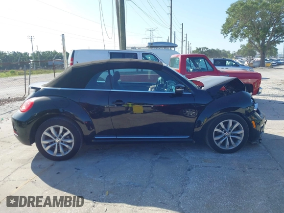 2015 Volkswagen Beetle with VIN 3VW5A7AT7FM811978, listed as a IAAI auction lot 41983986 with 84,421 mi miles and . Bid and sale history available at DreamBid. Image 13.
