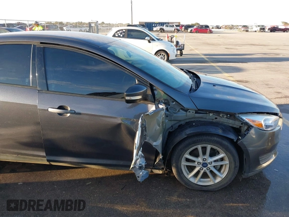 2017 Ford Focus SE with VIN 1FADP3F23HL342081, listed as a IAAI auction lot 41278282 with 88,572 mi miles. Bid and sale history available at carsss.com. Image 6.