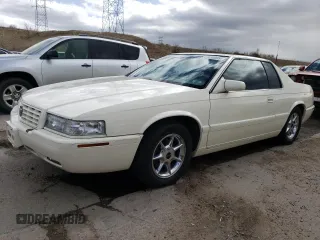 2002 Cadillac Eldorado z VIN 1G6EC12912B106675, wystawiony jako Copart lot #47630055 z przebiegiem 75 354 mil mil oraz Nie do naprawy • Non repairable. Historia ofert i sprzedaży dostępna na DreamBid. Obrazek 1.