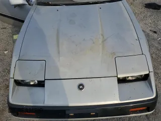 1984 Nissan 300ZX z VIN JN1HZ16S5EX016042, wystawiony jako Copart lot #86071904 z przebiegiem Nie podano mil oraz Szkoda całkowita • Salvage title. Historia ofert i sprzedaży dostępna na DreamBid. Obrazek 11.