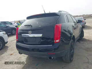 2013 Cadillac SRX z VIN 3GYFNAE3XDS654498, wystawiony jako IAAI lot #41740938 z przebiegiem 134 933 mil mil oraz . Historia ofert i sprzedaży dostępna na DreamBid. Obrazek 4.