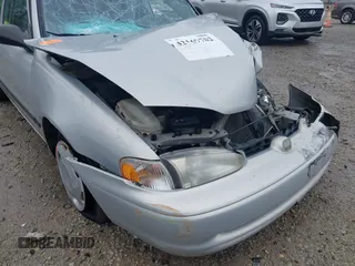 2001 Chevrolet Prizm z VIN 1Y1SK52851Z423703, wystawiony jako IAAI lot #42169702 z przebiegiem Nie podano mil oraz . Historia ofert i sprzedaży dostępna na DreamBid. Obrazek 19.