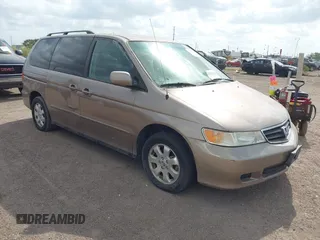 2003 Honda Odyssey EX-L with VIN 5FNRL18913B131371, listed as a IAAI auction lot 42453798 with 118,178 mi miles and . Bid and sale history available at DreamBid. Image 1.
