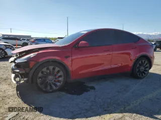 2023 Tesla Model Y Performance z VIN 7SAYGDEF9PF920016, wystawiony jako Copart lot #55779155 z przebiegiem 26 636 mil mil oraz Szkoda całkowita • Salvage title. Historia ofert i sprzedaży dostępna na DreamBid. Obrazek 1.