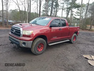 2010 Toyota Tundra 4WD Truck with VIN 5TFUM5F13AX008637, listed as a IAAI auction lot 41458700 with 212,845 mi miles. Bid and sale history available at carsss.com. Image 2.