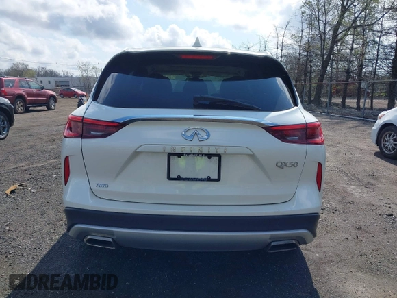 2019 Infiniti QX50 Luxe with VIN 3PCAJ5M37KF145057, listed as a IAAI auction lot 42015854 with 118,624 mi miles and . Bid and sale history available at DreamBid. Image 16.